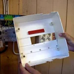 electric-enclosure-inside-hands-optimized-stixxpro-small.webp